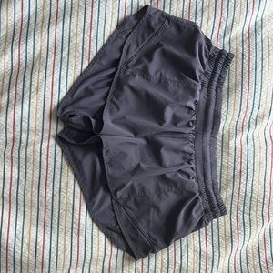 Lululemon Size 10 Hotty Hot Shorts 2.5 in inseam color: purple/grey